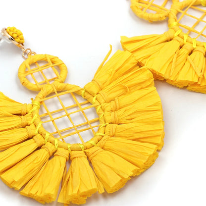 Statement Boho: Exaggerated Tassel Earrings