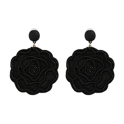 Statement Boho: Exaggerated Tassel Earrings