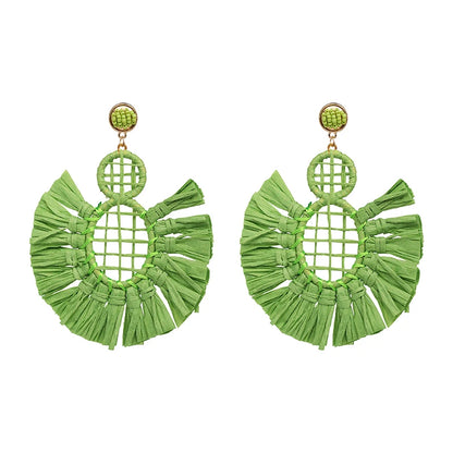 Statement Boho: Exaggerated Tassel Earrings