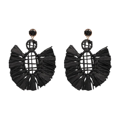 Statement Boho: Exaggerated Tassel Earrings