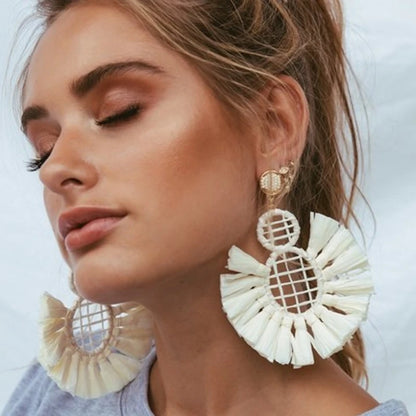 Statement Boho: Exaggerated Tassel Earrings