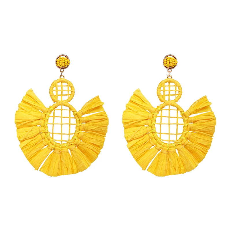 Statement Boho: Exaggerated Tassel Earrings