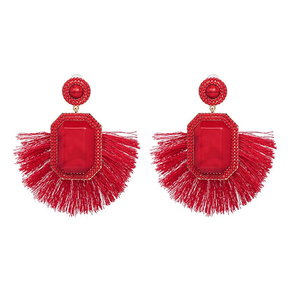 Statement Boho: Exaggerated Tassel Earrings