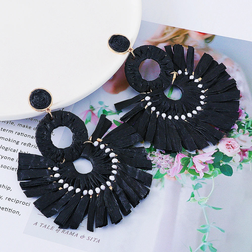 Statement Boho: Exaggerated Tassel Earrings