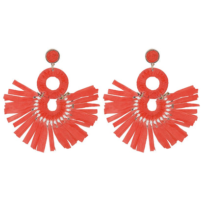 Statement Boho: Exaggerated Tassel Earrings