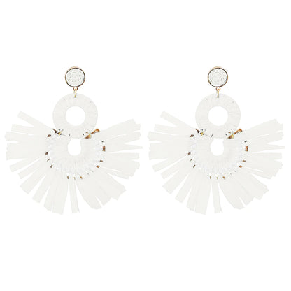 Statement Boho: Exaggerated Tassel Earrings