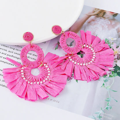 Statement Boho: Exaggerated Tassel Earrings
