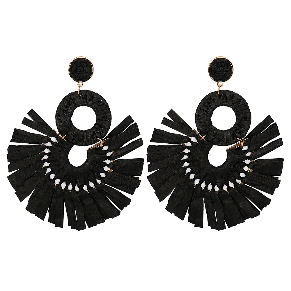 Statement Boho: Exaggerated Tassel Earrings