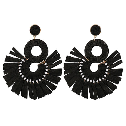 Statement Boho: Exaggerated Tassel Earrings