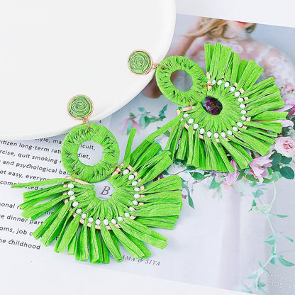 Statement Boho: Exaggerated Tassel Earrings