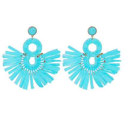 Statement Boho: Exaggerated Tassel Earrings