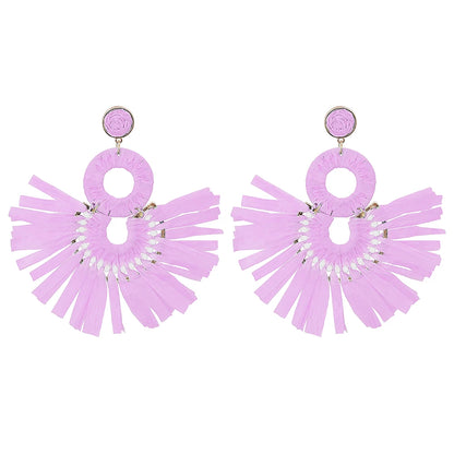 Statement Boho: Exaggerated Tassel Earrings