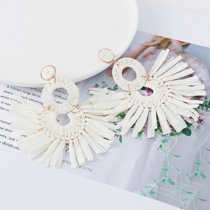 Statement Boho: Exaggerated Tassel Earrings