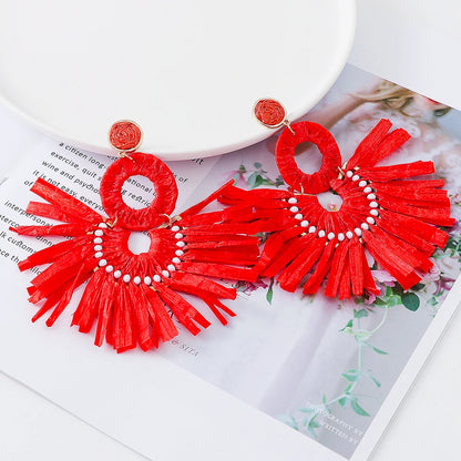 Statement Boho: Exaggerated Tassel Earrings