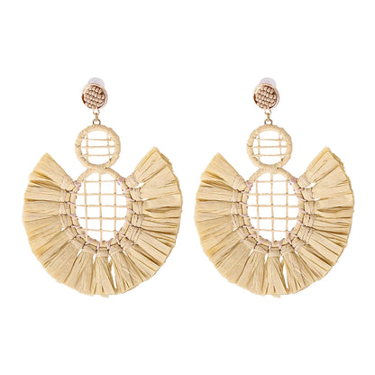 Statement Boho: Exaggerated Tassel Earrings