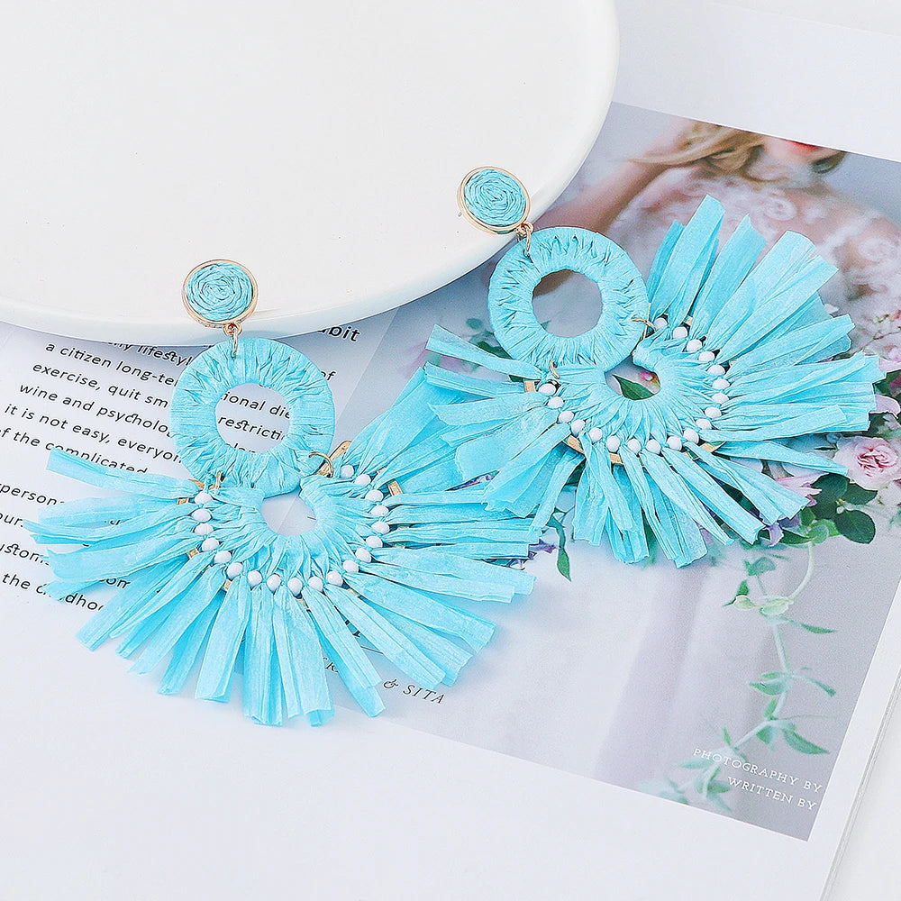 Statement Boho: Exaggerated Tassel Earrings