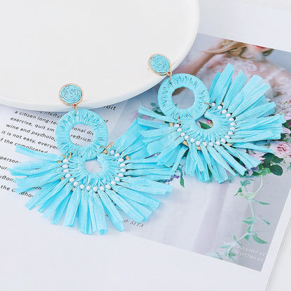 Statement Boho: Exaggerated Tassel Earrings