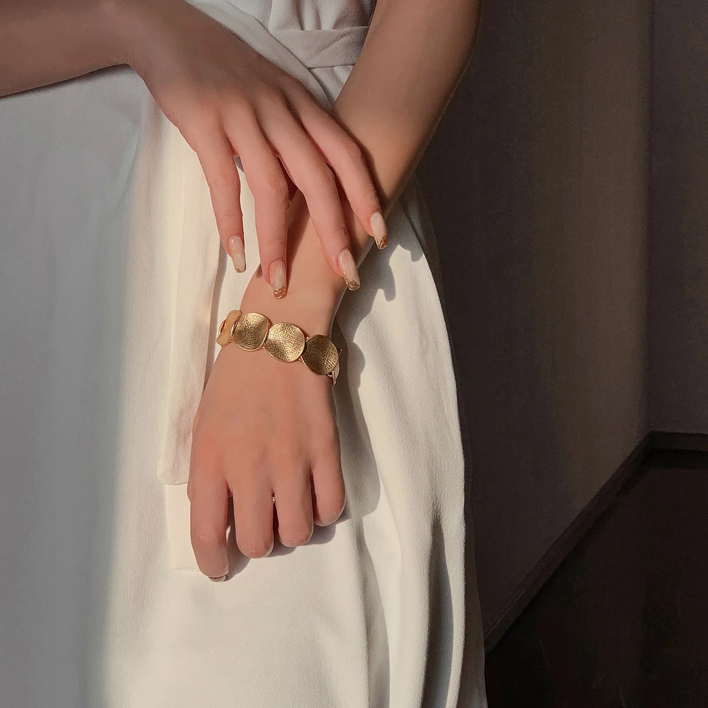 Interlocking Gold Charm Bracelet