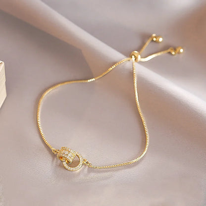 Interlocking Gold Charm Bracelet